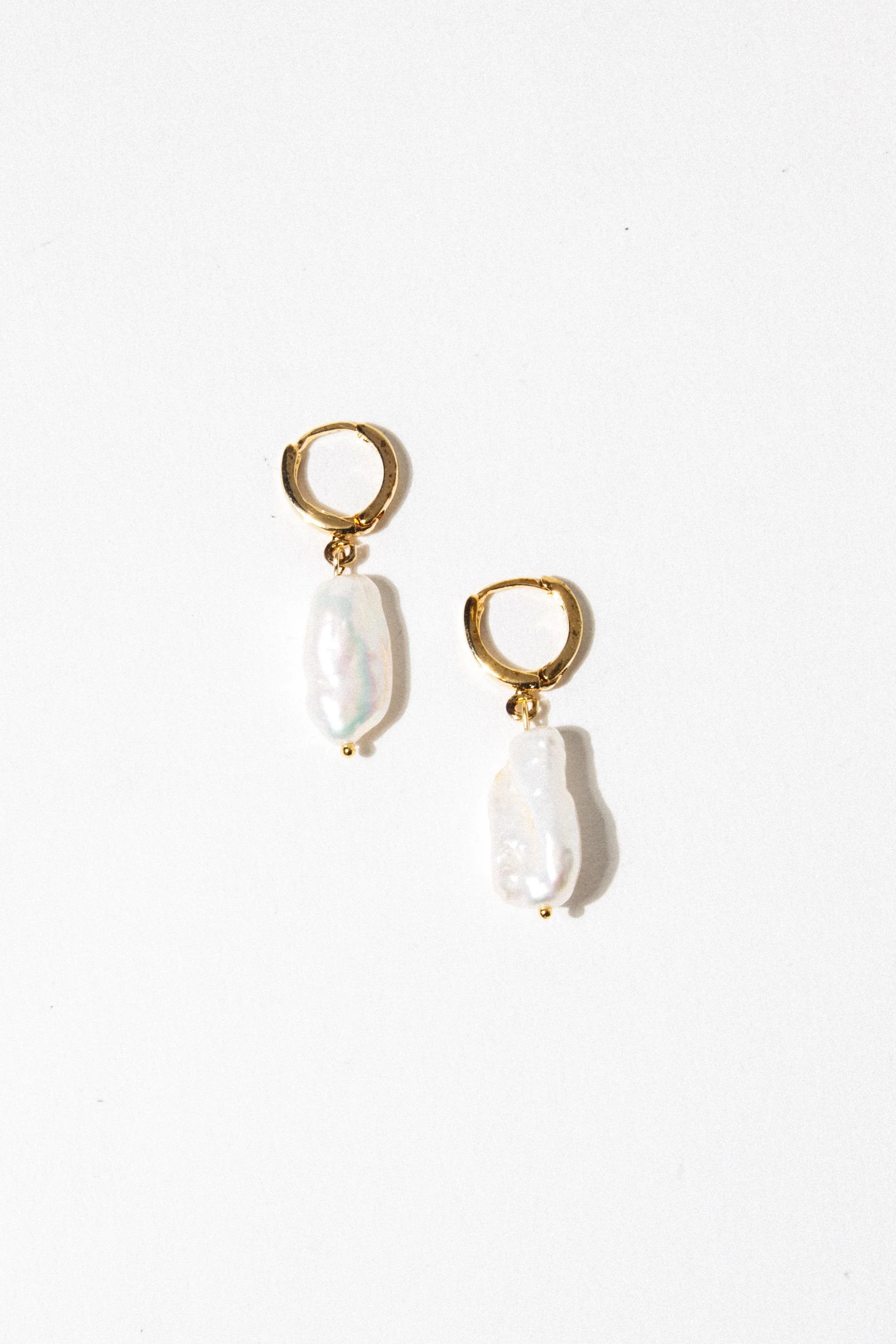 Elegance In Motion: Baroque Pearl Earrings